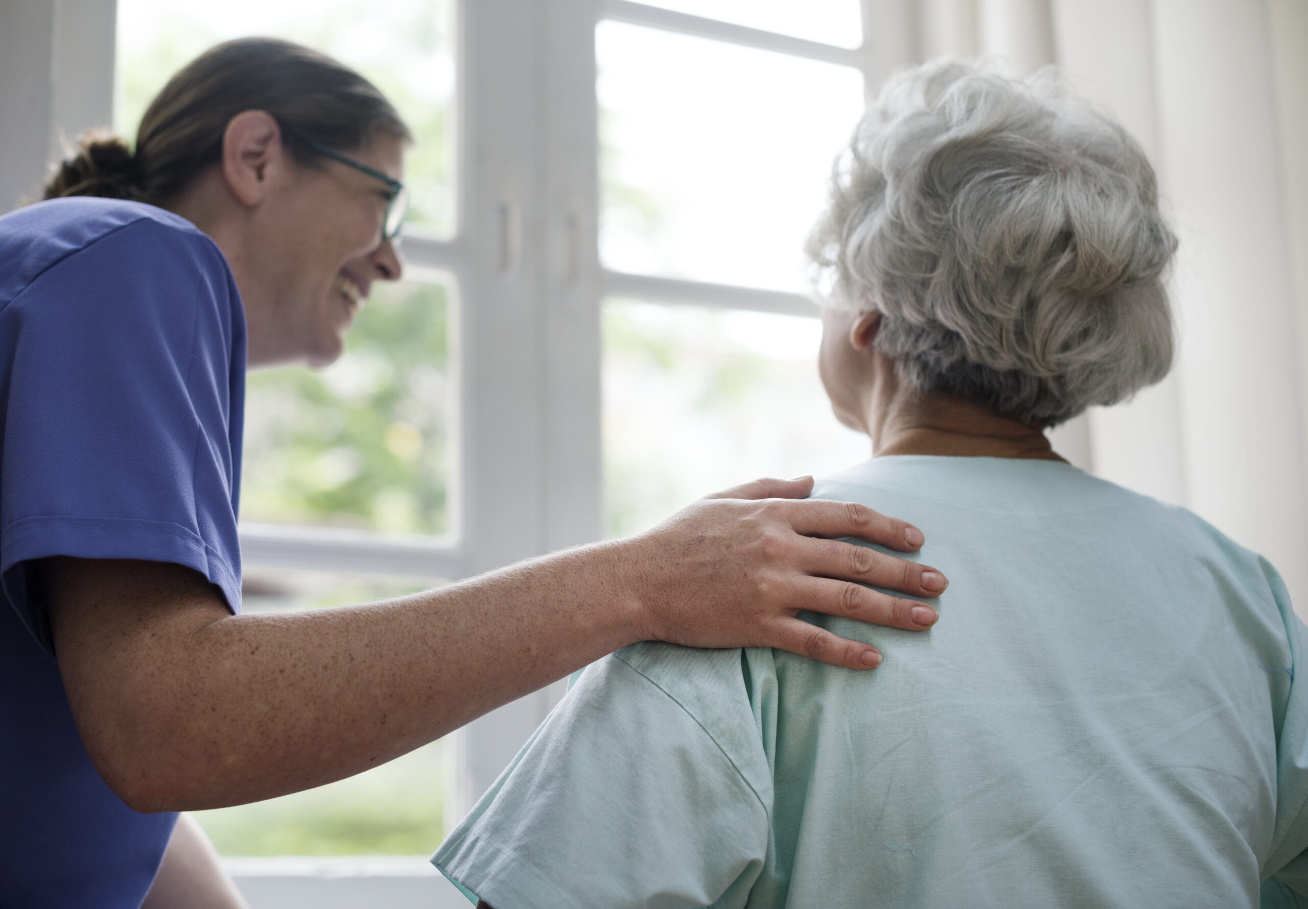 nurse-taking-care-old-woman (1)